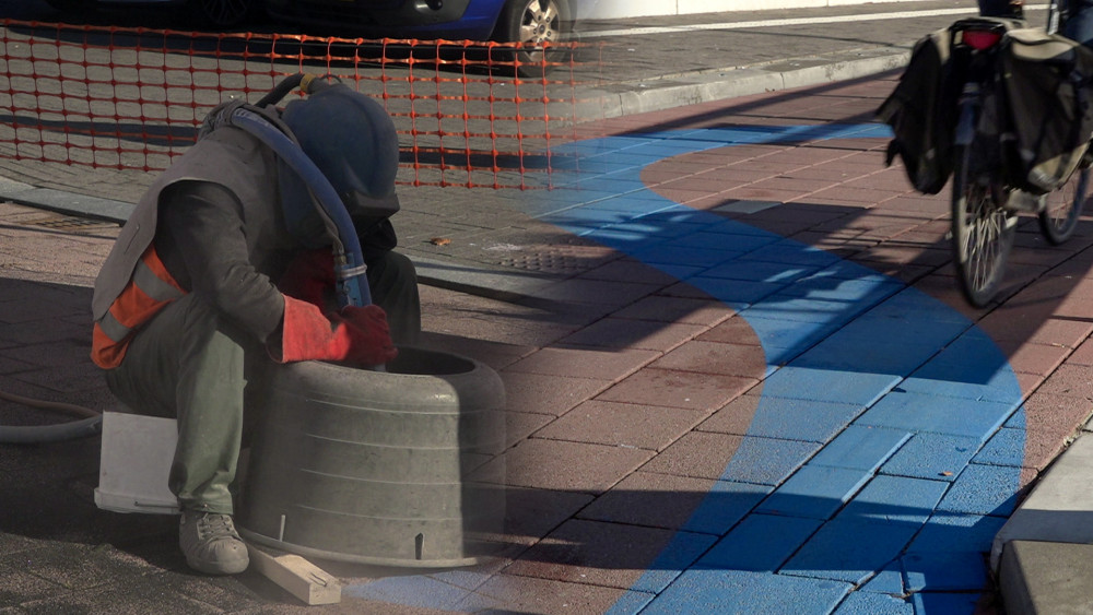 Blauwe lijnen in Hilversum verdwijderd van fietspad