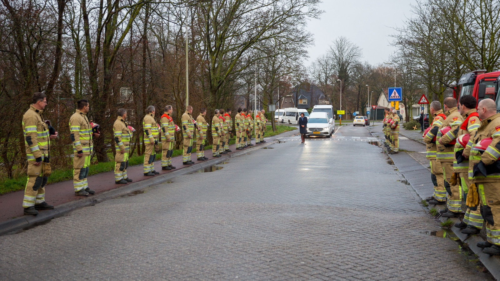 The fire brigade forms an honor guard for Maxime