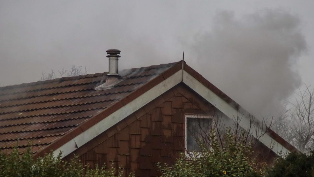 Brand in woning Julianadorp, bewoners op tijd buiten