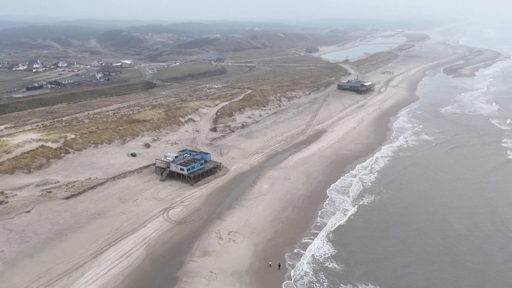 Strand Camperduin: zand vecht tegen water Home