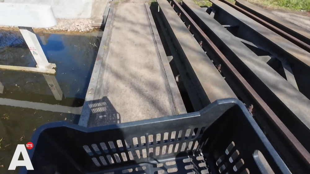 It’s not allowed, but cyclists flock to railway tracks and narrow bridge: "Fun challenge"