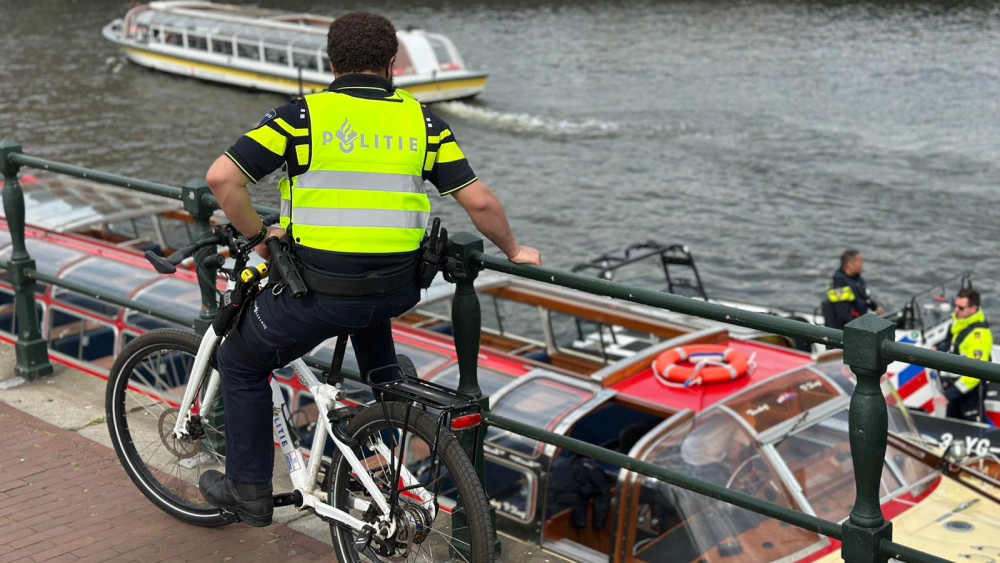 Suspect jumps into water during chase but cannot swim