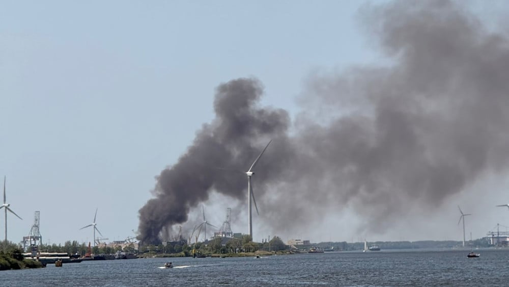 Large fire at waste processing plant in Western Port area, smoke visible from afar