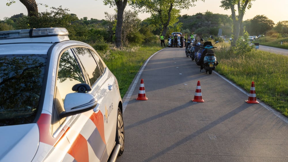 Injured in scooter collision, driver arrested