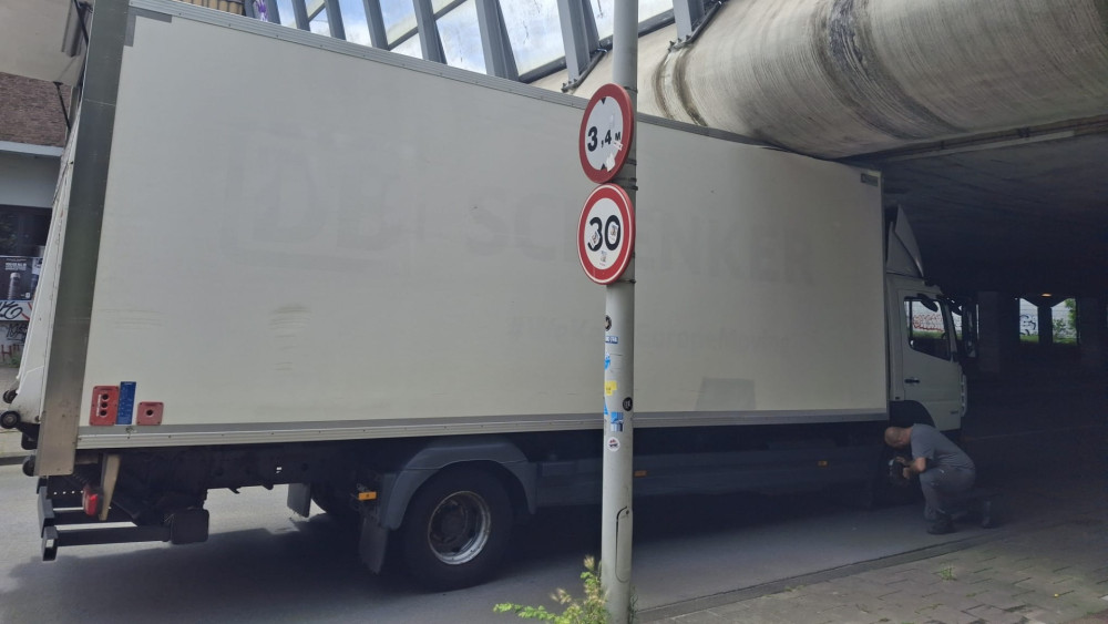 Truck gets stuck under A10 West overpass