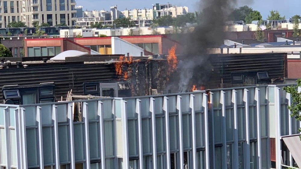 Fire on roof terrace of home on Borneo island