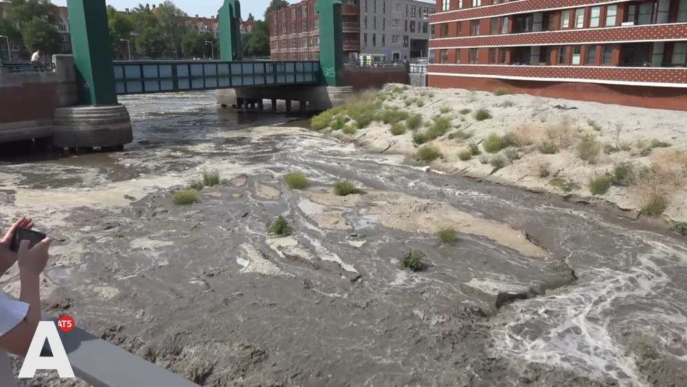 It was supposed to take two days, but this new Amsterdam canal was filled within an hour