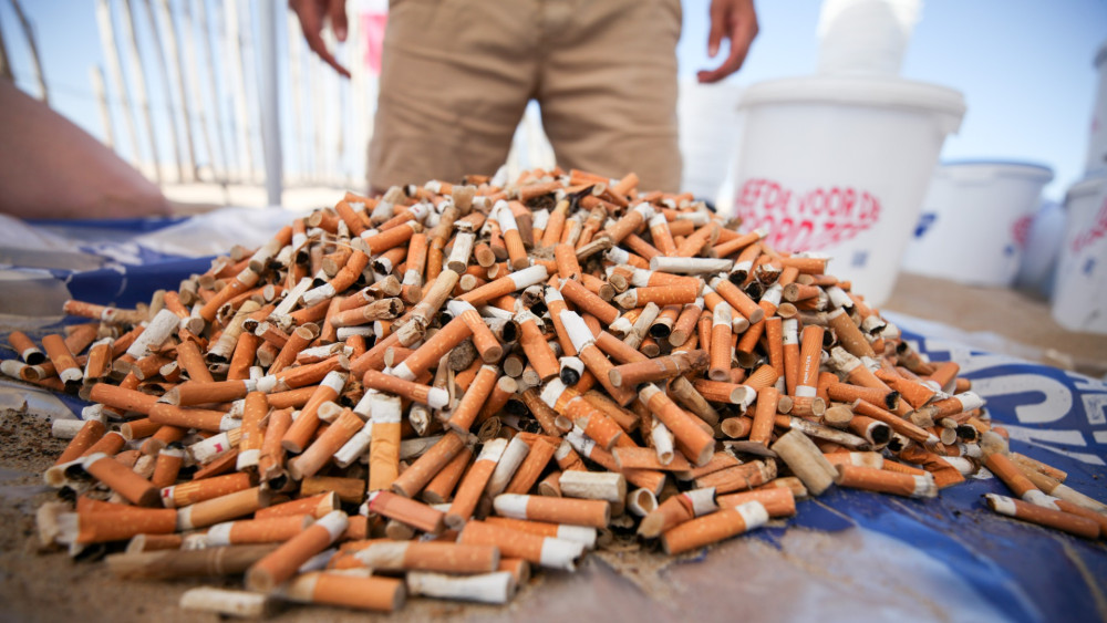 The beach as an ashtray: beachgoers leave thousands of cigarette filters behind