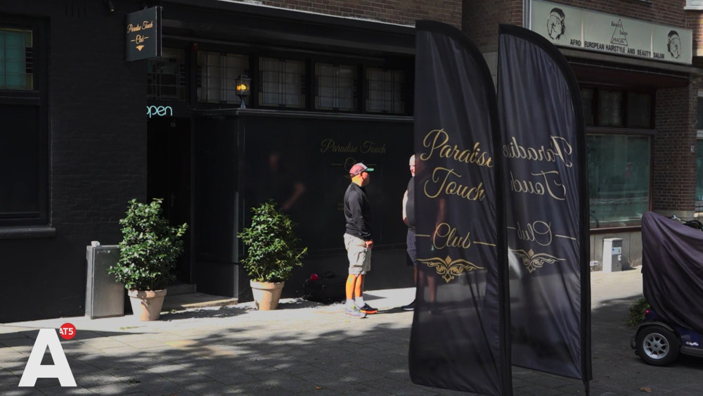 Are these flags for a 'naughty' massage parlor too 'juicy' for the municipality?