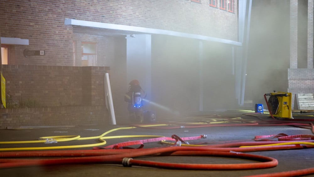 Local residents alarmed by thick smoke and stench from fire at Olympic Stadium